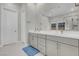 Modern bathroom features double sinks, quartz countertops, and stylish gray cabinetry at 313 Forsyth Park St, Las Vegas, NV 89138