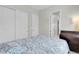 Bedroom features a comfortable bed, wardrobe, and classic dresser with a traditional lamp at 313 Forsyth Park St, Las Vegas, NV 89138