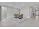 Dining area features table with bench and chairs. Large doorway opens to a hallway at 313 Forsyth Park St, Las Vegas, NV 89138
