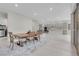 Dining area showcasing an open floor plan with a view of the kitchen and stainless steel appliances at 313 Forsyth Park St, Las Vegas, NV 89138