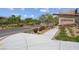 Community entrance with manicured landscaping, signage, and gated access for enhanced security and privacy at 313 Forsyth Park St, Las Vegas, NV 89138
