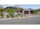 Beautiful single-story home with a three-car garage and desert landscaping at 313 Forsyth Park St, Las Vegas, NV 89138