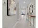 Bright hallway featuring modern art and decorative table, creating an elegant entrance at 313 Forsyth Park St, Las Vegas, NV 89138