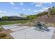 Community park with picnic tables, benches, and landscaping, offering a relaxing outdoor space for residents at 313 Forsyth Park St, Las Vegas, NV 89138