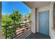 A serene balcony featuring a dark metal railing and a lovely view of the community's trees at 3318 N Decatur Blvd # 2129, Las Vegas, NV 89130