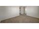 Bedroom features neutral carpet and closet, washer/dryer connections conveniently located nearby at 3318 N Decatur Blvd # 2129, Las Vegas, NV 89130