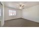 Bedroom with carpet, ceiling fan, and window with natural light at 3318 N Decatur Blvd # 2129, Las Vegas, NV 89130