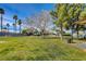 Serene community park offering lush grass and towering trees at 3318 N Decatur Blvd # 2129, Las Vegas, NV 89130