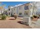 Community building featuring balconies, landscaped grounds, and architectural details at 3318 N Decatur Blvd # 2129, Las Vegas, NV 89130