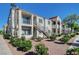 Exterior view of community buildings showcasing landscaped grounds and individual balconies at 3318 N Decatur Blvd # 2129, Las Vegas, NV 89130