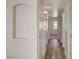 Hallway with wood-look floors, neutral paint and access to other rooms at 3318 N Decatur Blvd # 2129, Las Vegas, NV 89130