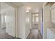 Hallway with access to the laundry and carpeted bedrooms at 3318 N Decatur Blvd # 2129, Las Vegas, NV 89130
