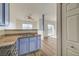Charming kitchen featuring blue cabinets and a stainless steel gas range at 3318 N Decatur Blvd # 2129, Las Vegas, NV 89130
