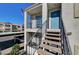 Stairway leading to the second-floor apartment with a balcony and parking nearby at 3318 N Decatur Blvd # 2129, Las Vegas, NV 89130