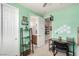 Spare bedroom with open closet, wood floors and desk at 3408 Livia Ave, North Las Vegas, NV 89031