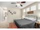 Primary bedroom featuring neutral walls, carpet, and natural lighting at 3408 Livia Ave, North Las Vegas, NV 89031