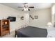 Comfortable bedroom featuring carpet, ceiling fan, and simple decor at 3408 Livia Ave, North Las Vegas, NV 89031