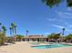 Resort-style community pool and lounge area with ample seating and palm trees at 3638 Via Messina, Henderson, NV 89052