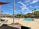 Resort-style community pool featuring clear water, shaded seating, and comfortable lounge chairs at 3638 Via Messina, Henderson, NV 89052