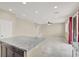 Open-concept living and kitchen area boasts recessed lighting and access to backyard at 3638 Via Messina, Henderson, NV 89052