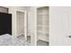Spacious pantry with ample shelving for organized storage and easy access at 3638 Via Messina, Henderson, NV 89052