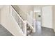 Carpeted staircase with white railing leading to the upper level of the home at 3638 Via Messina, Henderson, NV 89052