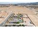 Overhead shot reveals a desert home, pool, and vast land against a desert backdrop at 3955 W Jo Rae Ave, Las Vegas, NV 89141