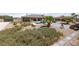 Desert home backyard showcasing native plantings and a view of the serene pool area at 3955 W Jo Rae Ave, Las Vegas, NV 89141