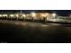 Well-lit, fenced home at night, boasting both security and curb appeal at 3955 W Jo Rae Ave, Las Vegas, NV 89141