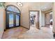 Grand foyer showcasing a decorative front door, tile flooring, and an entry to a walk-in closet at 3955 W Jo Rae Ave, Las Vegas, NV 89141