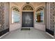 Beautiful front entrance with ornate double doors and decorative iron accents at 3955 W Jo Rae Ave, Las Vegas, NV 89141