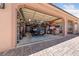Clean garage featuring vehicle, storage shelves, work bench and an automatic door at 3955 W Jo Rae Ave, Las Vegas, NV 89141