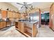 Beautiful kitchen with stainless steel appliances, granite counters, and a large island at 3955 W Jo Rae Ave, Las Vegas, NV 89141