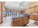 Spacious kitchen with a large island, modern appliances, and ample cabinet space at 3955 W Jo Rae Ave, Las Vegas, NV 89141