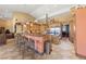 Open kitchen with stainless steel appliances, large island, and natural wood cabinetry at 3955 W Jo Rae Ave, Las Vegas, NV 89141