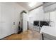 Well-organized laundry room with modern washer/dryer, ample storage, and bright lighting at 3955 W Jo Rae Ave, Las Vegas, NV 89141