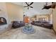 Large living room with hardwood flooring and a cozy fireplace at 3955 W Jo Rae Ave, Las Vegas, NV 89141