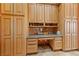 Office with ample storage, built in desk, and natural wood cabinetry at 3955 W Jo Rae Ave, Las Vegas, NV 89141