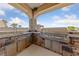 Elegant outdoor kitchen featuring stainless steel grill, sink, and stone veneer, perfect for entertaining at 3955 W Jo Rae Ave, Las Vegas, NV 89141