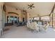 Expansive covered patio with comfortable seating, perfect for outdoor entertaining at 3955 W Jo Rae Ave, Las Vegas, NV 89141