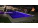 Sparkling pool with elegant lighting and landscaped features at 3955 W Jo Rae Ave, Las Vegas, NV 89141