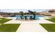 Inviting backyard pool featuring lounge chairs and a spa, perfect for relaxing and entertaining outdoors at 3955 W Jo Rae Ave, Las Vegas, NV 89141
