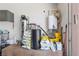 Tidy utility room with various water tanks, shelving and supplies at 3955 W Jo Rae Ave, Las Vegas, NV 89141