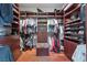 Spacious walk-in closet with custom shelving for organizing clothes and shoes at 3955 W Jo Rae Ave, Las Vegas, NV 89141