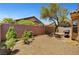 Well-maintained backyard with gravel, plants, and a grill at 4037 Vulcan St, Las Vegas, NV 89122