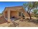 Exterior view of the backyard showcasing the patio and barbecue area at 4037 Vulcan St, Las Vegas, NV 89122