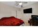 Bedroom featuring a bed, media center, and an ambient ceiling fan at 4037 Vulcan St, Las Vegas, NV 89122
