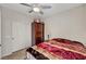 Comfortable bedroom with closet and stylish armoire, perfect for relaxation at 4037 Vulcan St, Las Vegas, NV 89122