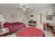 Bright bedroom featuring two beds, ceiling fan, and ample natural light at 4037 Vulcan St, Las Vegas, NV 89122