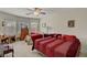 Expansive bedroom with two beds, side tables, lamps and bright natural light at 4037 Vulcan St, Las Vegas, NV 89122